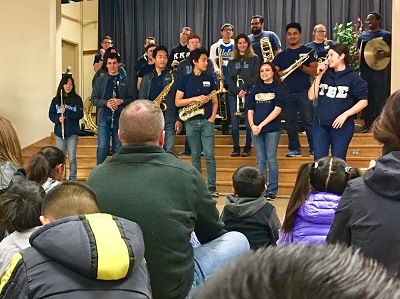 Tau Beta Sigma & Kappa Kappa Psi performing at Charles White Elementary